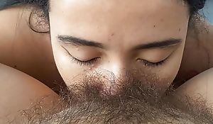 Engulfing her delectable hairy pussy
