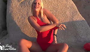 Beach fuck in red swimsuit